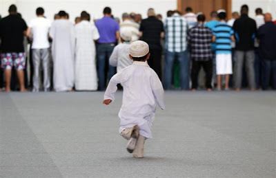 When it is a Friday, the angels stand at the gate of the Masjid